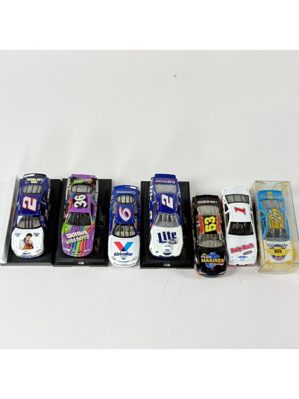 NASCAR Diecast Race Cars Lot of 7 1:64 Scale w Stands Collectible Stock Cars